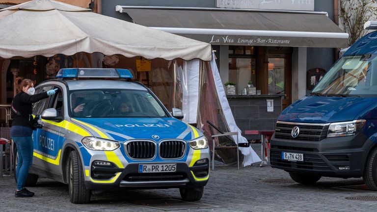 Police outside the bar in Weiden where the poisoning took place Pic: AP