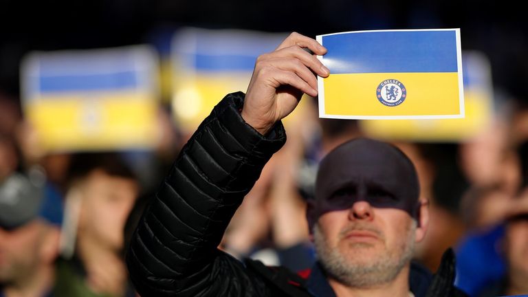 Chelsea fans are seen holding Ukrainian flags before the Carabao Cup final at Wembley Stadium, London. Picture date: Sunday 27th February, 2022.