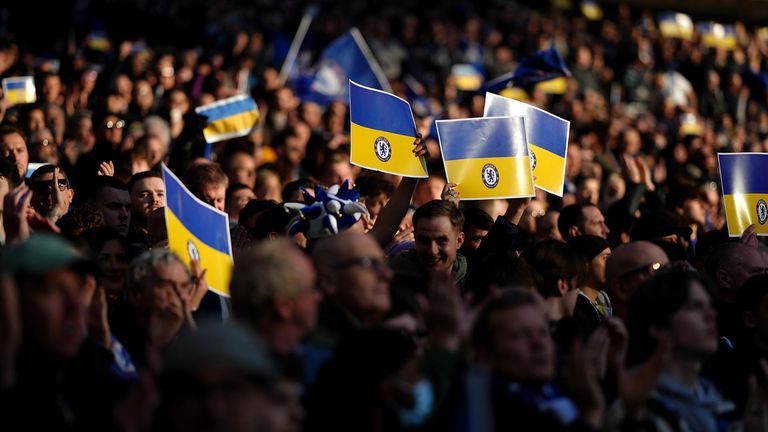 Chelsea fans are seen holding Ukrainian flags before the Carabao Cup final at Wembley Stadium, London. Picture date: Sunday 27th February, 2022.