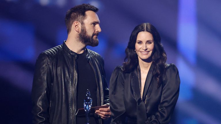 Johnny McDaid and Courteney Cox present during the Brit Awards in 2022  
