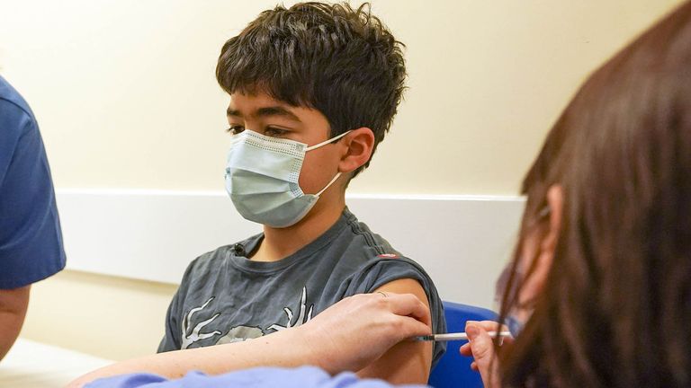 Xavier Aquilina, aged 11, has a Covid-19 vaccination at the Emberbrook Community Centre for Health, in Thames Ditton, Surrey. Picture date: Saturday January 29, 2022.