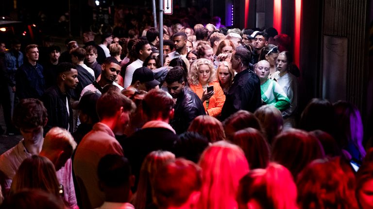A crowd gather outside a nightclub in Denmark&#39;s capital, Copenhagen. Pic: AP