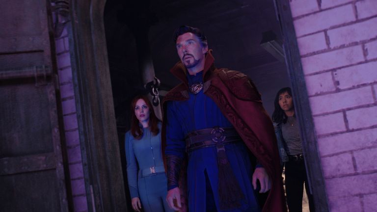 (L-R): Rachel McAdams as Dr. Christine Palmer, Benedict Cumberbatch as Dr. Stephen Strange, and Xochitl Gomez as America Chavez in Marvel Studios' DOCTOR STRANGE IN THE MULTIVERSE OF MADNESS. Photo courtesy of Marvel Studios. ..Marvel Studios 2022. All Rights Reserved.