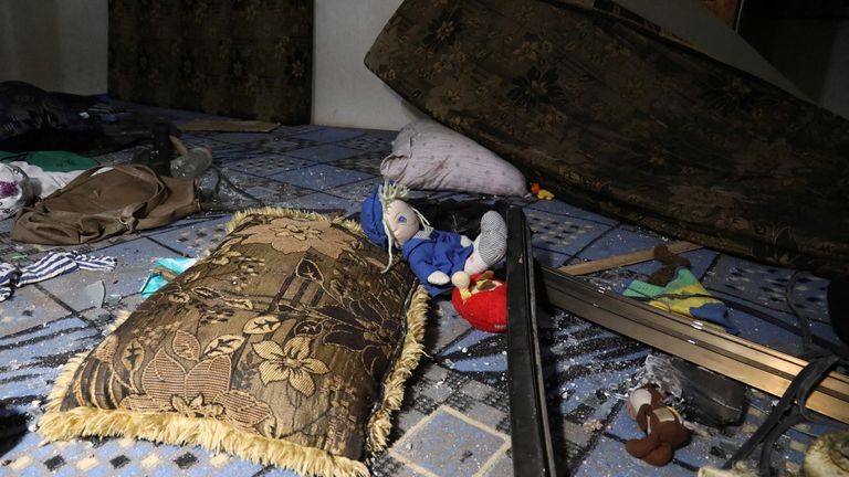 A doll lies among debris inside a house in the aftermath of a counter-terrorism mission conducted by the U.S. Special Operations Forces in Atmeh, Syria, February 3, 2022 in this picture obtained from social media. Courtesy of Mohamed Al-Daher/via REUTERS THIS IMAGE HAS BEEN SUPPLIED BY A THIRD PARTY. MANDATORY CREDIT. NO RESALES. NO ARCHIVES.
