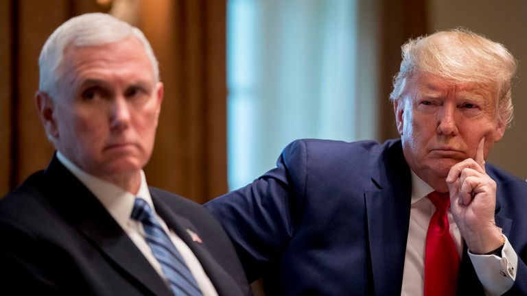 President Donald Trump and Vice President Mike Pence meet with pharmaceutical executives in the Cabinet Room of the White House, Monday, March 2, 2020, in Washington. (AP Photo/Andrew Harnik)                                                     