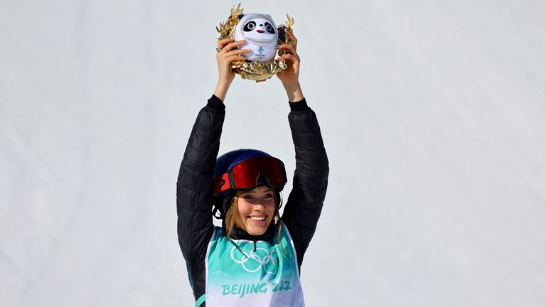 2022 Beijing Olympics - Freestyle Skiing - Women&#39;s Freeski Big Air - Final - Run 3 - Big Air Shougang, Beijing, China - February 8, 2022. Gold medallist Gu Ailing Eileen of China celebrates during the flower ceremony. REUTERS/Fabrizio Bensch