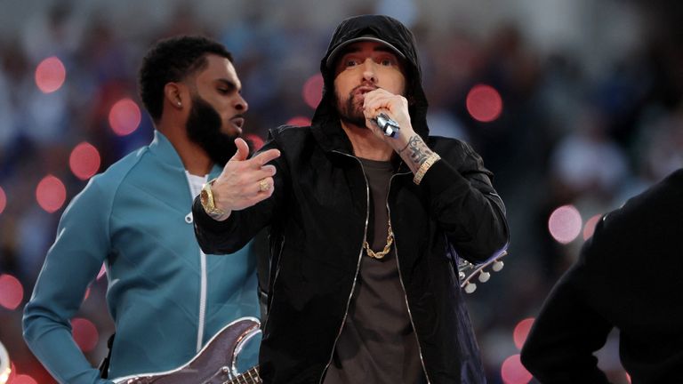 Eminem performed his track Lose Yourself in front of a band