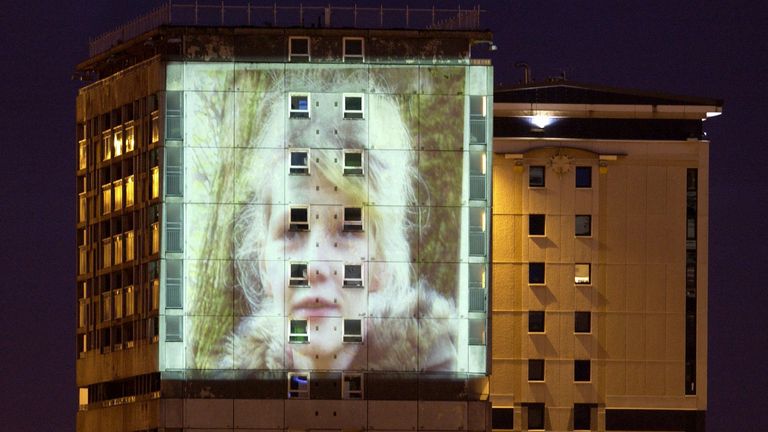 A picture of Emma Caldwell was projected by police onto a block of flats in Glasgow