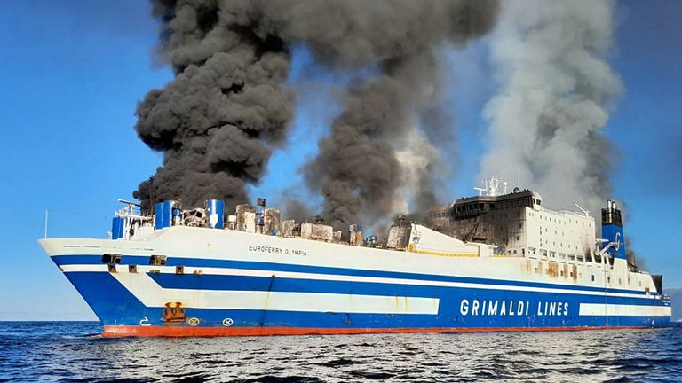 Smoke rises from the Italian-flagged Grimaldi Euroferry Olympia that caught fire off the coast of Corfu island, Greece, February 18, 2022, in this picture obtained from social media. Nikos Bardis ? debater.gr/via REUTERS THIS IMAGE HAS BEEN SUPPLIED BY A THIRD PARTY. MANDATORY CREDIT. NO RESALES. NO ARCHIVES.