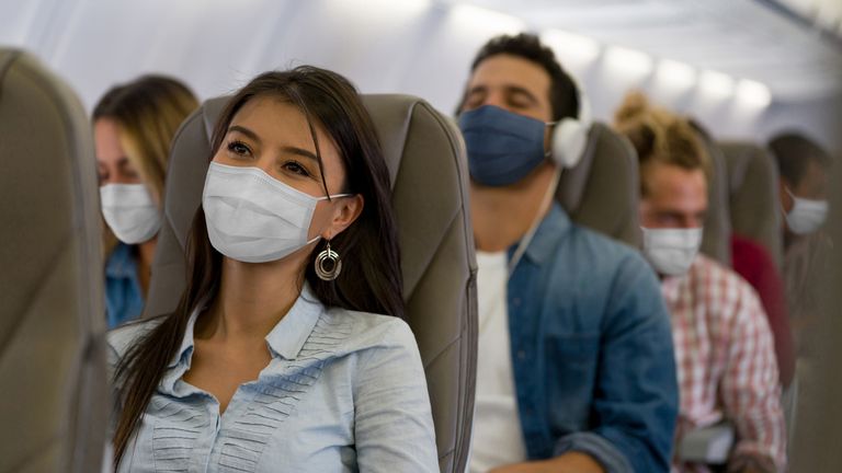 Face masks on flights will reportedly be one of the last measures to be lifted 