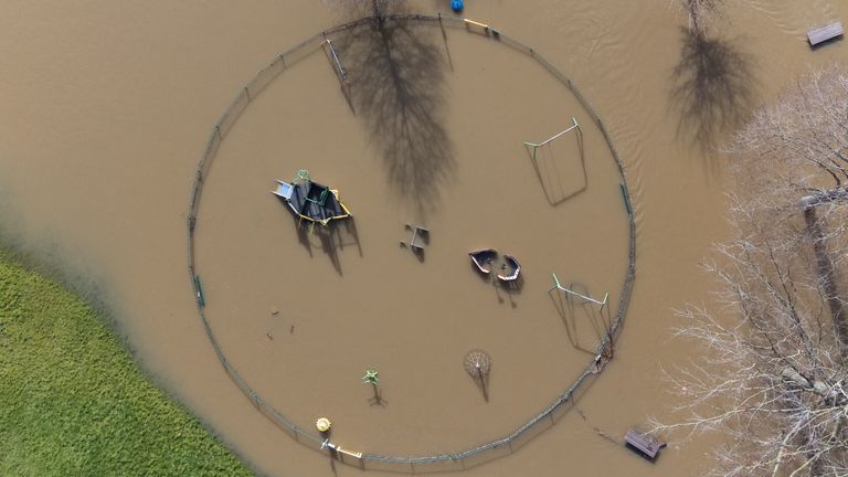 A children&#39;s playground submerged by floodwater after the River Severn burst its banks at Bewdley in Worcestershire. The Environment Agency has urged communities in parts of the West Midlands and the north of England, especially those along River Severn, to be prepared for significant flooding until Wednesday following high rainfall from Storm Franklin. Picture date: Tuesday February 22, 2022.
