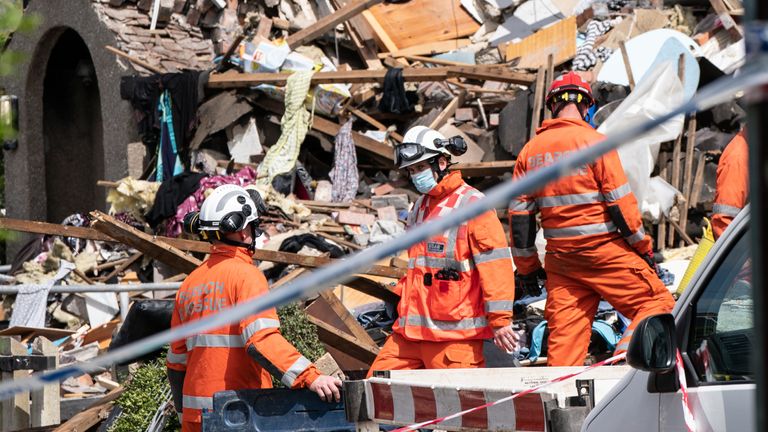 This photo taken on May 16, 21, of emergency workers at the scene of the gas explosion, in which George Hinds, two years old, died.  A couple have denied illegally killing their two-year-old neighbor in a gas explosion.  On Friday, Sharon Greenham, 51, and Darren Greenham, 44, pleaded not guilty at Preston Crown Court to the manslaughter of George Hinds.  Release date: Friday, February 11, 2022.