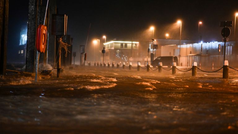 18 February 2022, Lower Saxony, Norddeich-Mole: Water presses against the ferry landing stage due to the storm.  Photo: AP