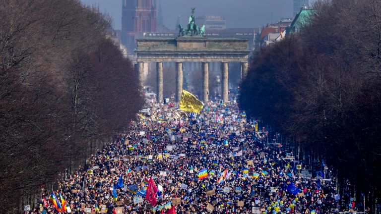 People walk down the bulevard &#39;Strasse des 17. Juni&#39; ahead of a rally against Russia&#39;s invasion of Ukraine in Berlin, Germany, Sunday, Feb. 27, 2022. (AP Photo/Markus Schreiber)  PIC:AP    