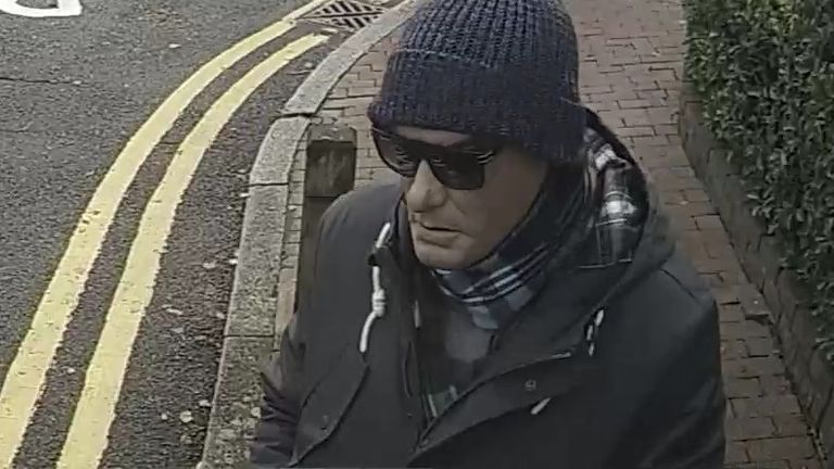 Anis Hemissi, wearing a latex mask and sunglasse on the junction of Battersea Church Road and Paveley Drive on 23 December 2019