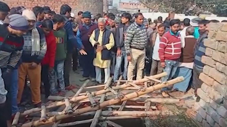 13 die in India village well collapse at wedding
Thirteen women and girls died while singing and dancing at a wedding after a concrete slab over an abandoned well collapsed under their weight in northern India