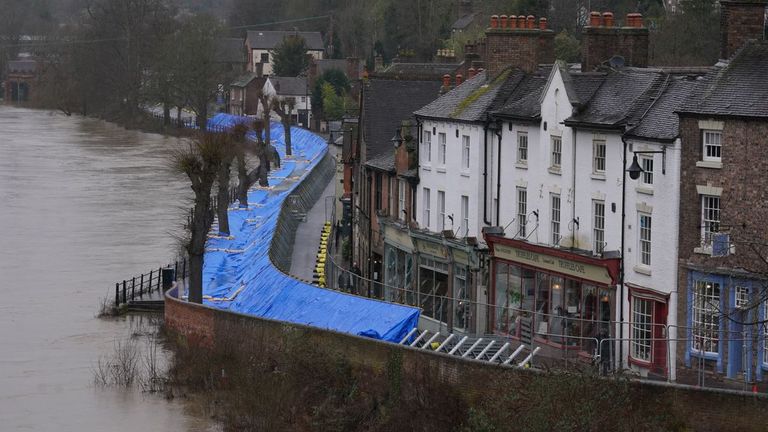 Flood barriers are erected along the River Severn in Ironbridge, Shropshire