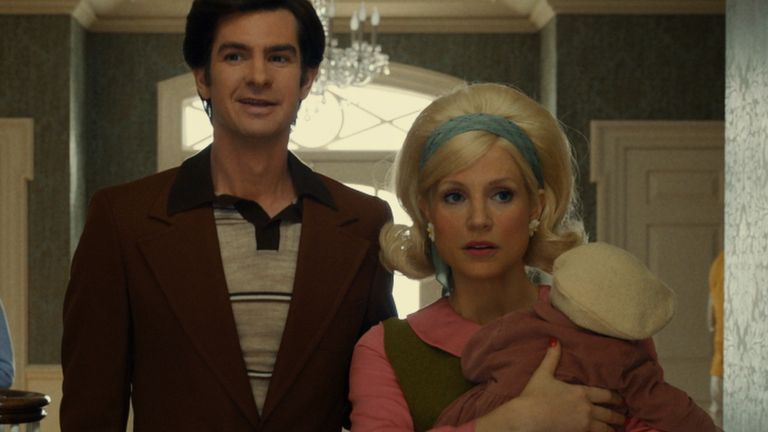 Andrew Garfield as Jim Bakker and Jessica Chastain as Tammy Faye Bakker in The Eyes Of Tammy Faye. Pic: Searchlight Pictures/ 20th Century Studios