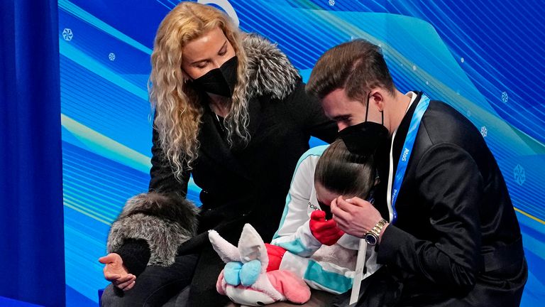 2022 Beijing Olympics - Figure Skating - Women Single Skating - Free Skating - Capital Indoor Stadium, Beijing, China - February 17, 2022. Kamila Valieva of the Russian Olympic Committee reacts with coaches Daniil Gleikhengauz and Eteri Tutberidze after her performance. REUTERS/Evgenia Novozhenina
