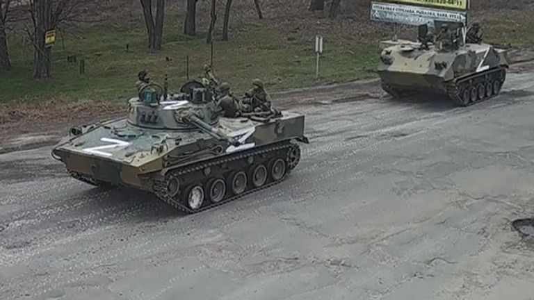 Tanks, believed to be Russian, are seen crossing into a southern Ukrainian province