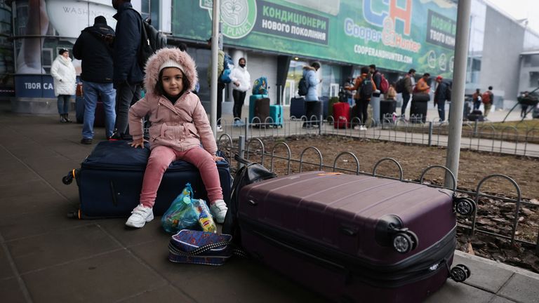 People wait to return to the city at Kyiv Airport after Russian President Vladimir Putin authorized a military operation in eastern Ukraine, February 24, 2022. REUTERS/Umit Bektas
