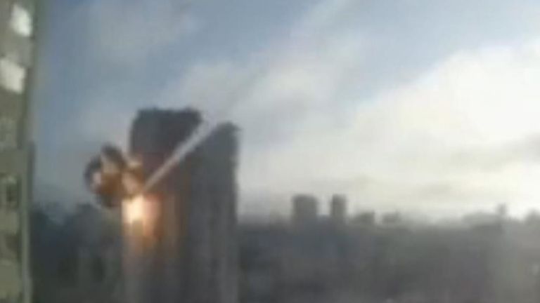 Sky News has verified and located two videos which show a missile hitting an apartment block in the west of Kyiv.