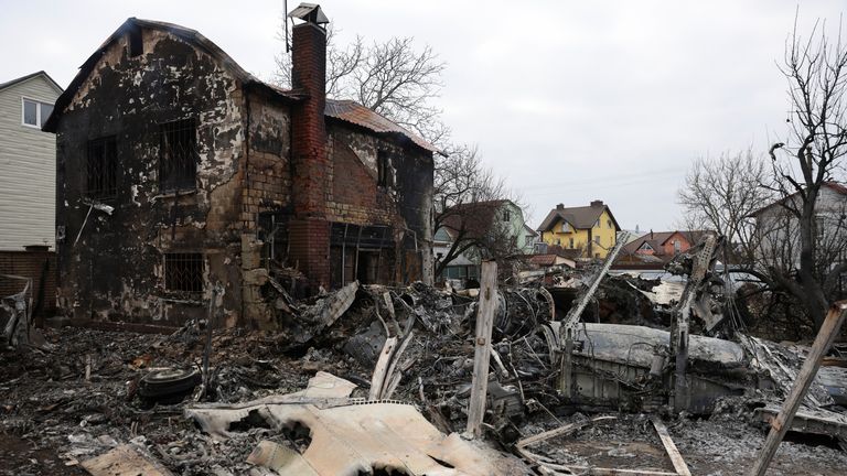 View of the wreckage of an unidentified aircraft that crashed into a house in a residential area, after Russia launched a massive military operation against Ukraine, in Kyiv, Ukraine February 25, 2022. REUTERS/Umit Bektas
