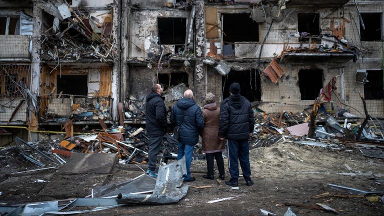 People look at the damage following a rocket attack the city of Kyiv, Ukraine, Friday, Feb. 25, 2022. (AP Photo/Emilio Morenatti)
PIC:AP