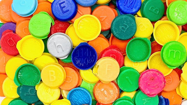 Smartie tube lids found by Tracey Williams during Cornwall beach cleans. Pic: Tracey Williams