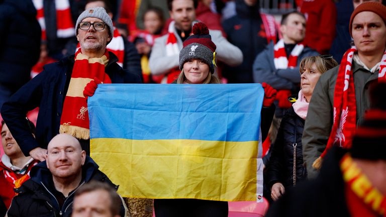 Soccer Football - Carabao Cup Final - Chelsea v Liverpool - Wembley Stadium, London, Britain - February 27, 2022 Liverpool fan with with a Ukraine flag inside the stadium before the match Action Images via Reuters/John Sibley
