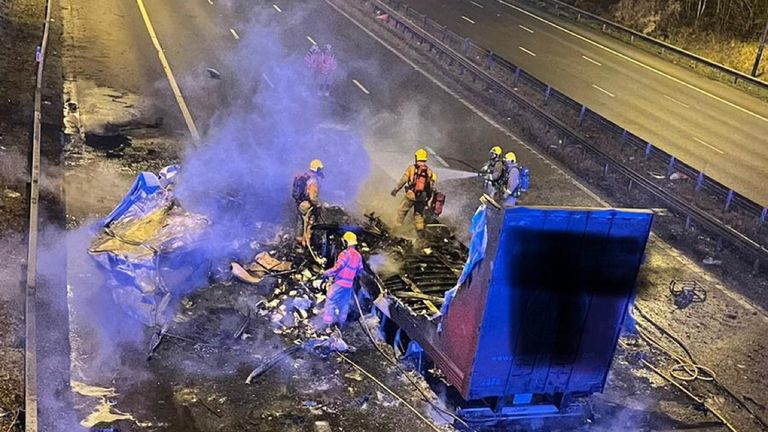 Handout photo issued by Lancs Road Police of a lorry fire on the M6 in Lancashire, between junctions 27 and 28, which started when high winds caused the HGV to hit a bridge. Issue date: Monday February 21, 2022.
