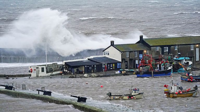 Waves crash over the sea wall at the harbour in Lyme Regis in Dorset as Storm Eunice hits the south coast, with attractions closing, travel disruption and a major incident declared in some areas, meaning people are warned to stay indoors. Picture date: Friday February 18, 2022.