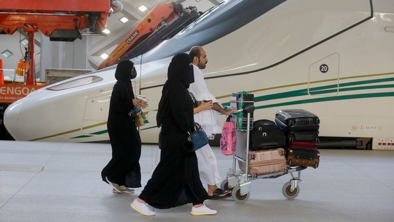 Pilgrims on their way to Mecca walk past the Haramain High-Speed Railway train in the holy city of Medina, Saudi Arabia, Thursday, Aug. 8, 2019. Hundreds of thousands of Muslims have arrived in the kingdom to participate in the annual hajj pilgrimage, which starts Friday, a ritual required of all able-bodied Muslims at least once in their life. (AP Photo/Amr Nabil)
PIC:AP

