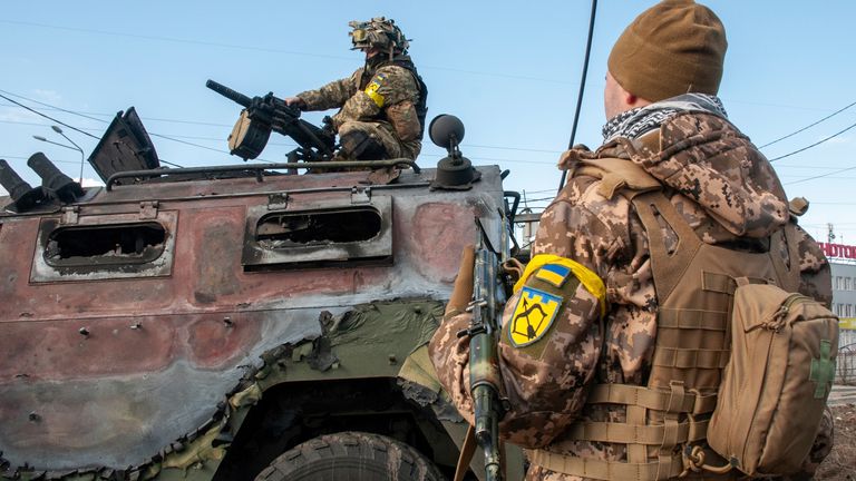 Ukrainian soldiers inspect a damaged military vehicle after fighting in Kharkiv, Ukraine, Sunday, Feb. 27, 2022. The city authorities said that Ukrainian forces engaged in fighting with Russian troops that entered the country&#39;s second-largest city on Sunday. (AP Photo/Marienko Andrew)

PIC:AP
