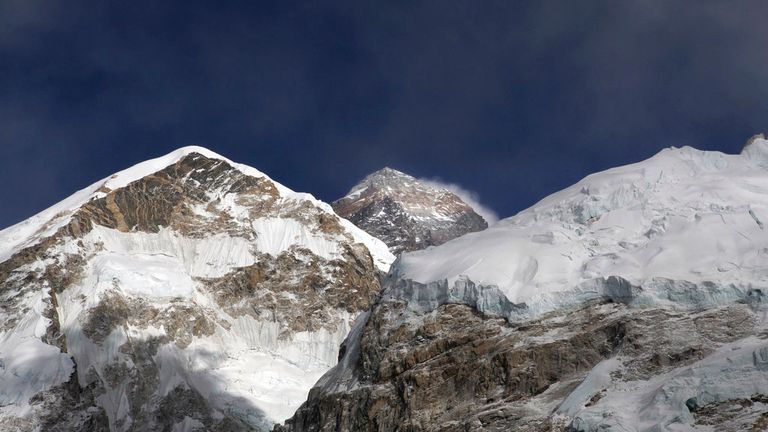 The research is a "wake-up call" even Mount Everest, pictured centre, can be impacted by global warming Pic: AP/Tashi Sherpa