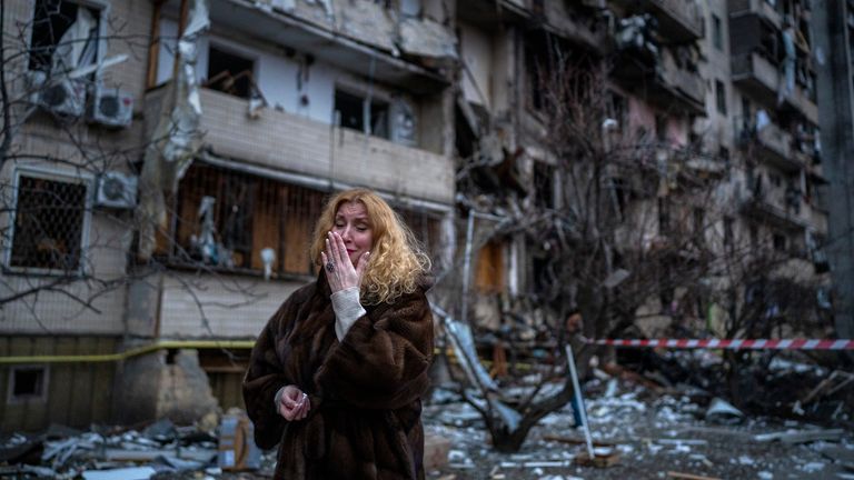 Natali Sevriukova reacts next to her house following a rocket attack the city of Kyiv, Ukraine, Friday, Feb. 25, 2022. (AP Photo/Emilio Morenatti)
PIC:AP


