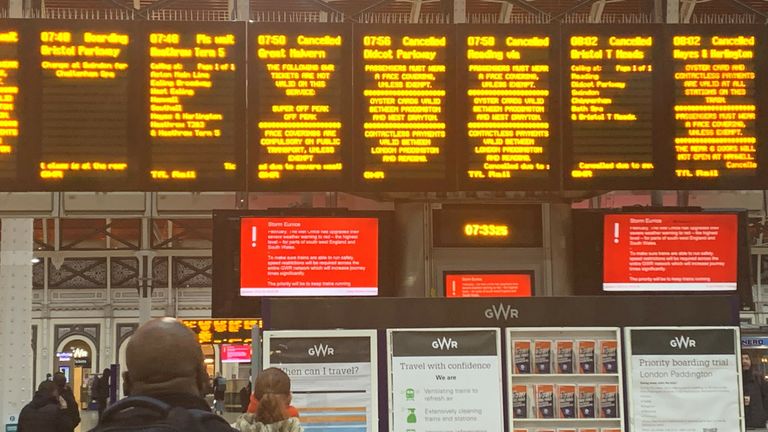 A sign at London's Paddington station shows cancelled trains after Storm Eunice hit the south coast, with attractions closing, travel disruption and a major incident declared in some areas urging people to stay indoors. Picture date: Friday February 18, 2022.
