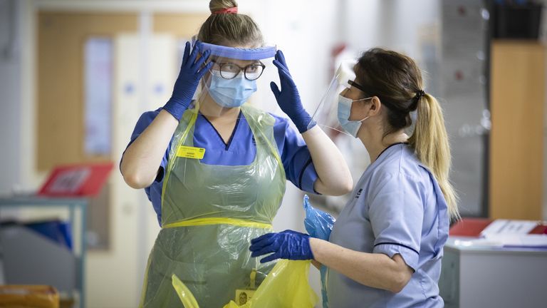 File photo dated 27/01/21 of nurses changing their PPE on Ward 5, a Covid Red Ward, at the Royal Alexandra Hospital in Paisley. Personal protective equipment (PPE) worth £2.8 billion is not fit for purpose and cannot be used by the NHS, a health minister has revealed. Issue date: Friday September 17, 2021. 