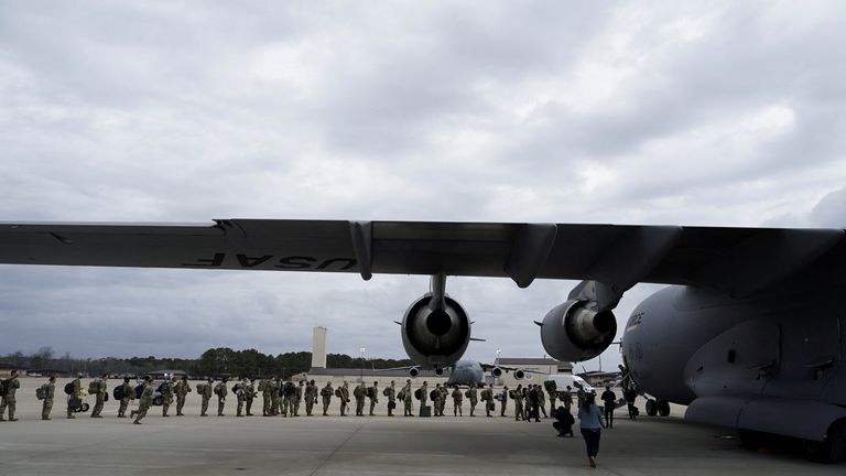 Paratroopers with the US Army, 82nd Airborne Division prepare for deployment to Eastern Europe amid escalating tensions between Ukraine and Russia, at Fort Bragg, North Carolina, U.S., February 3, 2022. REUTERS/Bryan Woolston
