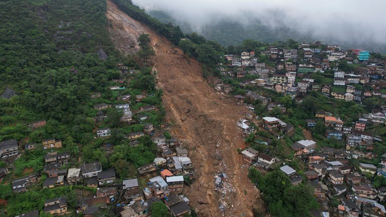 An aerial view of a neighborhood affected by landslides in Petropolis, Brazil, Wednesday, Feb. 16, 2022. Extremely heavy rains set off mudslides and floods in a mountainous region of Rio de Janeiro state, killing multiple people, authorities reported. (AP Photo/Silvia Izquierdo)
PIC:AP