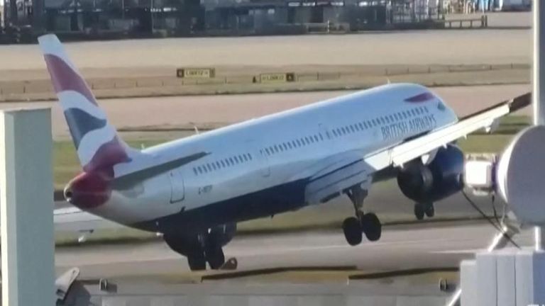 Plane aborts attempt to land at London airport in high winds