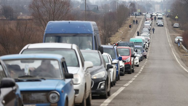 A long line of cars heads for the Polish border near 26 km before the Poland in Ukraine on February 27, 2022. Lots of Ukrainians are heading to Poland to escape the war. Russian President Vladimir Putin announced a special military operation and a multi-pronged attack on several Ukrainian cities has continued.  ( The Yomiuri Shimbun via AP Images )
PIC:AP