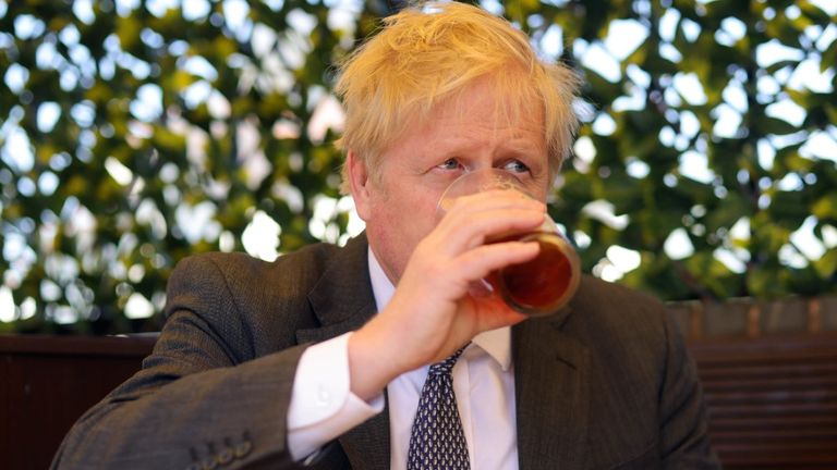 The prime minister enjoying a beer on 19 April 2021