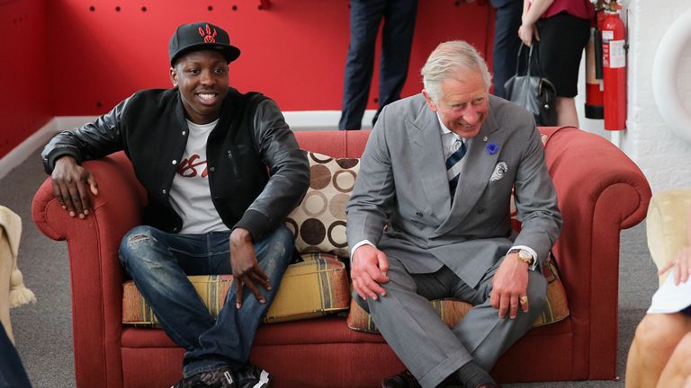 File photo dated 29/07/13 of the Prince of Wales on a sofa with Jamal Edwards during a live session at the launch of the Prince&#39;s Trust Summer Sessions at the Princes&#39;s Trust in Historic Chatham Dockyard in Chatham, Kent. British entrepreneur Jamal Edwards has died at the age of 31, according to the BBC. Issue date: Sunday February 20, 2022.
