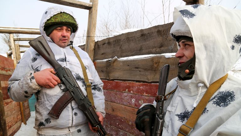 Pro-Russian servicemen in a trench in an area controlled by pro-Russian militants on the frontline near Spartak village in Yasynuvata, Donetsk region. Pic: AP