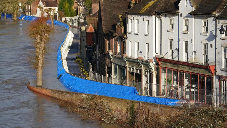 Flood defenses along the wharfage next to the river severn following high winds and wet weather in ironbridge, shropshire. The environment agency is urging communities in parts of the west midlands and yorkshire, especially those along the rivers severn and ouse, to be prepared for significant flooding following high rainfall from storm franklin. Picture date: wednesday february 23, 2022.