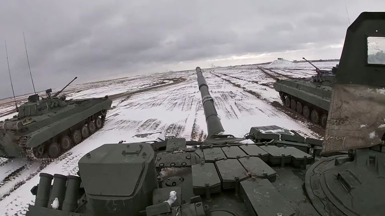 Tanks ride during joint exercises of the armed forces of Russia and Belarus as part of an inspection of the Union State&#39;s Response Force, at a firing range in Belarus, in this still image from a handout video released February 2, 2022. Russian Defence Ministry/Handout via REUTERS ATTENTION EDITORS - THIS IMAGE HAS BEEN SUPPLIED BY A THIRD PARTY. MANDATORY CREDIT. NO RESALES. NO ARCHIVES.
