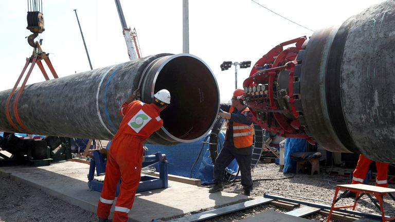 bFILE PHOTO: Workers are seen at the construction site of the Nord Stream 2 gas pipeline, near the town of Kingisepp, Leningrad region, Russia, June 5, 2019. REUTERS/Anton Vaganov/File Photo

