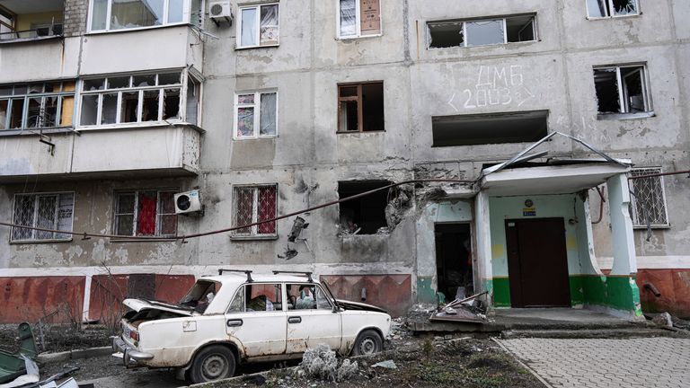 An apartment building damaged following a rocket attack on the city of Mariupol, Ukraine, Friday, Feb. 25, 2022. Russian troops are bearing down on Ukraine&#39;s capital, with gunfire and explosions resonating ever closer to the government quarter. The invasion of a democratic country has fueled fears of wider war in Europe and triggered worldwide efforts to make Russia stop. (AP Photo/Evgeniy Maloletka)


