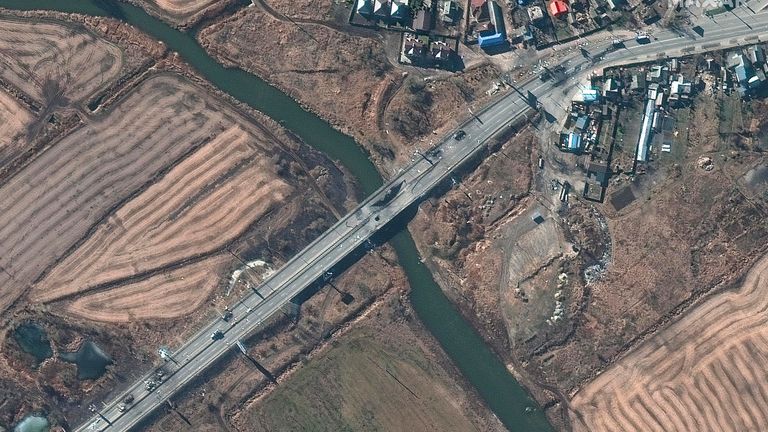 This satellite image provided by Maxar Technologies shows destroyed vehicles and bridge damage in Irpin, northwest of Kyiv, Ukraine, Monday Feb. 27, 2022. (Satellite image ..2022 Maxar Technologies via AP)
PIC:MAXAR/AP